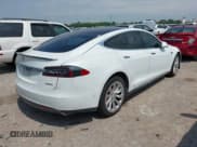 ✅ 2014 Tesla Model S P85D • VIN: 5YJSA1H21EFP68208 • Lot: 42490416. Listed on IAAI with 153,973 mi. Free auction sales archive from the USA and detailed vehicle history report at DreamBid. Image 4.
