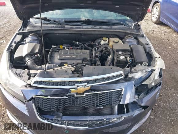 2013 Chevrolet Cruze 1LT z VIN 1G1PC5SB1D7232128, wystawiony jako IAAI lot #40415492 z przebiegiem 159 418 mil mil oraz . Historia ofert i sprzedaży dostępna na DreamBid. Obrazek 10.