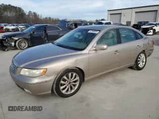 2006 Hyundai Azera SE z VIN KMHFC46F86A109521, wystawiony jako Copart lot #42508805 z przebiegiem 215 583 mil mil oraz Szkoda całkowita • Salvage title. Historia ofert i sprzedaży dostępna na DreamBid. Obrazek 1.