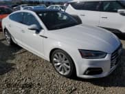 ✅ 2018 Audi A5 Sportback Premium Plus • VIN: WAUBNCF50JA135616 • Лот: 85399005. Опубликован ранее на Copart с пробегом 59 405 миль. Бесплатный доступ к архиву аукционных продаж из США и подробный отчёт об истории автомобиля на DreamBid. Изображение 4.