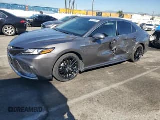 ✅ 2021 Toyota Camry Hybrid XSE • VIN: 4T1K31AK5MU550245 • Lot: 90407405. Listed on Copart with 59,084 mi. Free auction sales archive from the USA and detailed vehicle history report at DreamBid. Image 1.