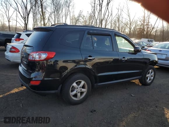✅ 2012 Hyundai Santa Fe Limited • VIN: 5XYZKDAG0CG104233 • Лот: 81154684. Опубликован ранее на Copart с пробегом 131 394 миль. Бесплатный доступ к архиву аукционных продаж из США и подробный отчёт об истории автомобиля на DreamBid. Изображение 3.