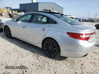 2013 Hyundai Azera с VIN KMHFH4JG1DA230244, выставлен на аукционе Copart как лот 51990655 с пробегом 150 607 миль миль и Списание • Salvage title. История ставок и продаж доступна на DreamBid. Изображение 2.