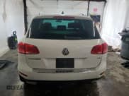 ✅ 2014 Volkswagen Touareg Exec • VIN: WVGEP9BPXED005251 • Лот: 81401085. Опубликован ранее на Copart с пробегом 112 481 миль. Бесплатный доступ к архиву аукционных продаж из США и подробный отчёт об истории автомобиля на DreamBid. Изображение 6.