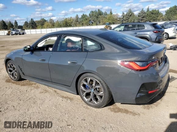 ✅ 2024 BMW i4 M50 • VIN: WBY33AW06RFR83552 • Лот: 89640145. Опубликован ранее на Copart с пробегом 11 007 миль. Бесплатный доступ к архиву аукционных продаж из США и подробный отчёт об истории автомобиля на DreamBid. Изображение 2.