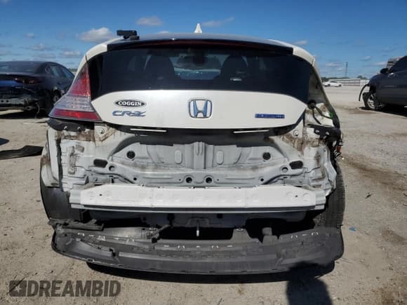 ✅ 2015 Honda CR-Z EX • VIN: JHMZF1D64FS003294 • Lot: 90452195. Listed on Copart with 86,990 mi. Free auction sales archive from the USA and detailed vehicle history report at DreamBid. Image 6.