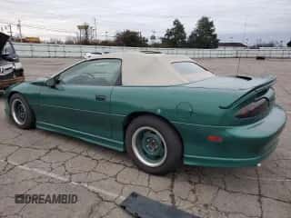 1997 Chevrolet Camaro z VIN 2G1FP32K5V2124866, wystawiony jako Copart lot #86287254 z przebiegiem 84 997 mil mil oraz Szkoda całkowita • Salvage title. Historia ofert i sprzedaży dostępna na DreamBid. Obrazek 2.