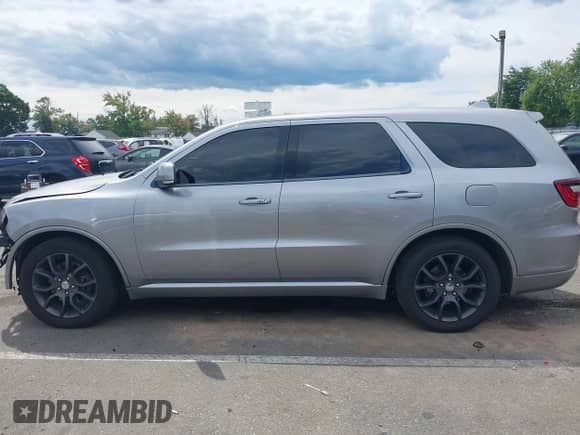 2017 Dodge Durango R/T with VIN 1C4SDJCT4HC606761, listed as a IAAI auction lot 43107117 with 87,878 mi miles and . Bid and sale history available at DreamBid. Image 14.