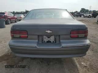 1991 Chevrolet Caprice z VIN 1G1BN53E4MW194283, wystawiony jako Copart lot #71869145 z przebiegiem 33 840 mil mil oraz Szkoda całkowita • Salvage title. Historia ofert i sprzedaży dostępna na DreamBid. Obrazek 6.