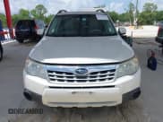 ✅ 2012 Subaru Forester X Premium • VIN: JF2SHBDC3CH424796 • Lot: 42425913. Listed on IAAI with 156,848 mi. Free auction sales archive from the USA and detailed vehicle history report at DreamBid. Image 6.