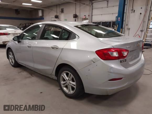 2017 Chevrolet Cruze LT with VIN 3G1BE5SM8HS571093, listed as a IAAI auction lot 43222199 with 137,766 mi miles and . Bid and sale history available at DreamBid. Image 3.