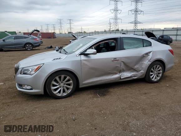 ✅ 2015 Buick LaCrosse Leather • VIN: 1G4GB5G38FF272464 • Лот: 86590435. Опубликован ранее на Copart с пробегом 164 365 миль. Бесплатный доступ к архиву аукционных продаж из США и подробный отчёт об истории автомобиля на DreamBid. Изображение 1.