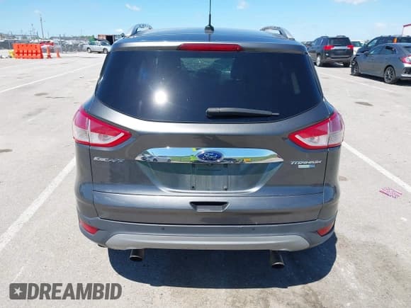✅ 2015 Ford Escape Titanium • VIN: 1FMCU9J92FUB01007 • Lot: 42319246. Listed on IAAI with 90,782 mi. Free auction sales archive from the USA and detailed vehicle history report at DreamBid. Image 17.