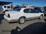 ✅ 1994 Chrysler LHS • VIN: 2C3ED56F9RH225470 • Lot: 83089504. Listed on Copart with 154,488 mi. Free auction sales archive from the USA and detailed vehicle history report at DreamBid. Image 3.