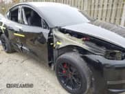 ✅ 2022 Tesla Model Y Long Range • VIN: 7SAYGAEE2NF307710 • Lot: 43544182. Listed on IAAI with 63,135 mi. Free auction sales archive from the USA and detailed vehicle history report at DreamBid. Image 6.