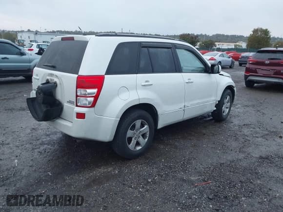 ✅ 2010 Suzuki Grand Vitara XSport • VIN: JS3TE0D41A4100728 • Lot: 43446177. Listed on IAAI with 102,657 mi. Free auction sales archive from the USA and detailed vehicle history report at DreamBid. Image 4.
