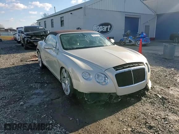 ✅ 2013 Bentley Continental GT • VIN: SCBGT3ZA2DC081822 • Лот: 84201784. Опубликован ранее на Copart с пробегом 39 423 миль. Бесплатный доступ к архиву аукционных продаж из США и подробный отчёт об истории автомобиля на DreamBid. Изображение 13.