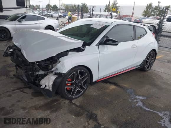 2020 Hyundai Veloster z VIN KMHT36AH6LU008009, wystawiony jako IAAI lot #41775605 z przebiegiem 84 029 mil mil oraz . Historia ofert i sprzedaży dostępna na DreamBid. Obrazek 2.