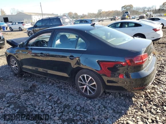 ✅ 2018 Volkswagen Jetta SE • VIN: 3VWDB7AJ2JM219680 • Lot: 90397135. Listed on Copart with 60,299 mi. Free auction sales archive from the USA and detailed vehicle history report at DreamBid. Image 2.