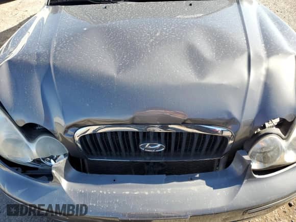 2004 Hyundai Sonata GLS z VIN KMHWF35H94A085053, wystawiony jako Copart lot #49443565 z przebiegiem 79 190 mil mil oraz Szkoda całkowita • Salvage title. Historia ofert i sprzedaży dostępna na DreamBid. Obrazek 13.