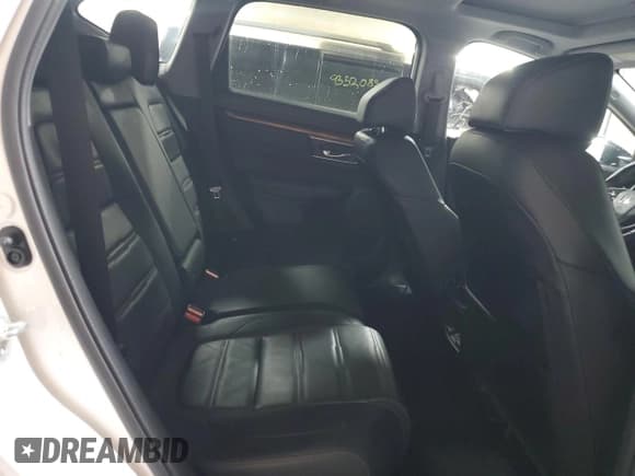 ✅ 2021 Honda CR-V Touring • VIN: 2HKRW2H97MH649971 • Lot: 93375235. Listed on Copart with 100,965 mi. Free auction sales archive from the USA and detailed vehicle history report at DreamBid. Image 10.