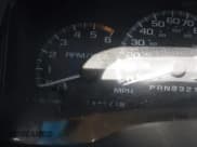 ✅ 1999 Cadillac Escalade • VIN: 1GYEK13R4XR411823 • Lot: 41221246. Wystawiony na IAAI z przebiegiem 184 123 mil. Bezpłatny archiwum sprzedaży aukcyjnych z USA i szczegółowy raport historii pojazdu na DreamBid. Zdjęcie 7.