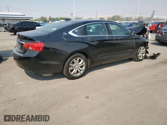 ✅ 2017 Chevrolet Impala LT • VIN: 1G1105S35HU150580 • Лот: 71301794. Опубликован ранее на Copart с пробегом 165 318 миль. Бесплатный доступ к архиву аукционных продаж из США и подробный отчёт об истории автомобиля на DreamBid. Изображение 3.