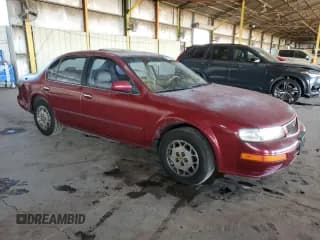 ✅ 1996 Nissan Maxima GXE • VIN: JN1CA21D4TT120977 • Lot: 81770864. Listed on Copart with 168,059 mi. Free auction sales archive from the USA and detailed vehicle history report at DreamBid. Image 4.