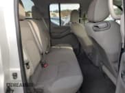 ✅ 2009 Nissan Frontier SE • VIN: 1N6AD09W89C402373 • Lot: 76950464. Listed on Copart with 138,337 mi. Free auction sales archive from the USA and detailed vehicle history report at DreamBid. Image 10.