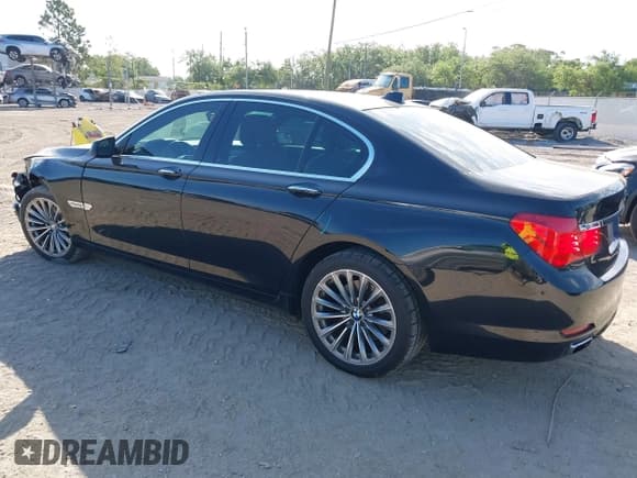 ✅ 2012 BMW 7 Series 740i • VIN: WBAKA4C51CC613636 • Lot: 41908801. Listed on IAAI with 127,725 mi. Free auction sales archive from the USA and detailed vehicle history report at DreamBid. Image 3.