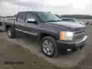 2010 Chevrolet Silverado 1500 LT with VIN 3GCRCSE02AG204959, listed as a Copart auction lot 82320935 with 118,013 mi miles and Salvage title. Bid and sale history available at DreamBid. Image 4.