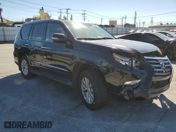 ✅ 2015 Lexus GX 460 • VIN: JTJBM7FXXF5117734 • Lot: 90464135. Listed on Copart with 104,085 mi. Free auction sales archive from the USA and detailed vehicle history report at DreamBid. Image 4.