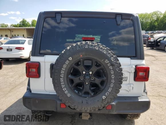 ✅ 2021 Jeep Wrangler Sport • VIN: 1C4GJXANXMW827523 • Lot: 59334145. Wystawiony na Copart z przebiegiem 21 031 mil. Bezpłatny archiwum sprzedaży aukcyjnych z USA i szczegółowy raport historii pojazdu na DreamBid. Zdjęcie 6.