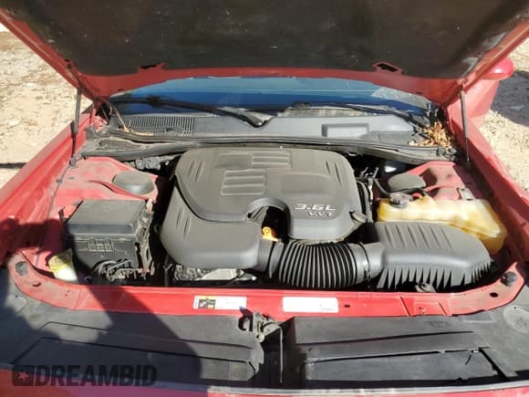 ✅ 2013 Dodge Challenger SXT Plus • VIN: 2C3CDYAG7DH570272 • Lot: 76894524. Wystawiony na Copart z przebiegiem 131 827 mil. Bezpłatny archiwum sprzedaży aukcyjnych z USA i szczegółowy raport historii pojazdu na DreamBid. Zdjęcie 11.