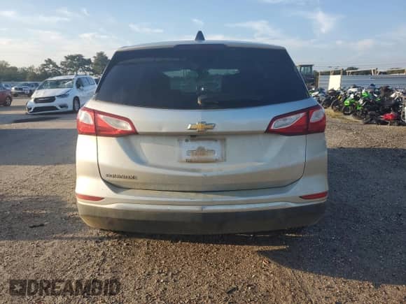 2018 Chevrolet Equinox LS с VIN 3GNAXHEV5JS592094, выставлен на аукционе Copart как лот 71883555 с пробегом 197 686 миль миль и Списание • Salvage title. История ставок и продаж доступна на DreamBid. Изображение 6.