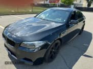 ✅ 2015 BMW M5 • VIN: WBSFV9C56FD595096 • Lot: 76574074. Listed on Copart with 61,779 mi. Free auction sales archive from the USA and detailed vehicle history report at DreamBid. Image 2.