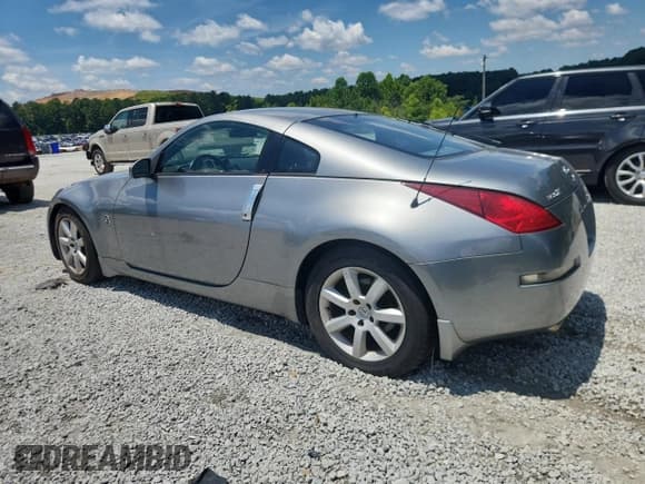 ✅ 2004 Nissan 350Z Touring • VIN: JN1AZ34D94T163231 • Lot: 63439675. Listed on Copart with 138,510 mi. Free auction sales archive from the USA and detailed vehicle history report at DreamBid. Image 2.