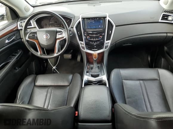 ✅ 2013 Cadillac SRX Performance Collection • VIN: 3GYFNHE36DS521908 • Lot: 65402415. Listed on Copart with 124,799 mi. Free auction sales archive from the USA and detailed vehicle history report at DreamBid. Image 8.