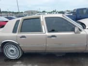 ✅ 1997 Lincoln Town Car Signature • VIN: 1LNLM82W9VY742564 • Lot: 42338729. Listed on IAAI with 206,178 mi. Free auction sales archive from the USA and detailed vehicle history report at DreamBid. Image 13.