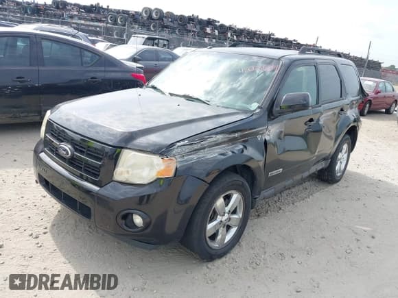 ✅ 2008 Ford Escape Limited • VIN: 1FMCU04178KE77007 • Lot: 42078654. Listed on IAAI with 233,168 mi. Free auction sales archive from the USA and detailed vehicle history report at DreamBid. Image 2.