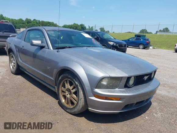 ✅ 2006 Ford Mustang GT Deluxe • VIN: 1ZVFT82H065176946 • Lot: 42472942. Listed on IAAI with 157,711 mi. Free auction sales archive from the USA and detailed vehicle history report at DreamBid. Image 1.