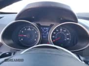 ✅ 2013 Hyundai Veloster w/Black Int • VIN: KMHTC6AD5DU128883 • Lot: 90024835. Wystawiony na Copart z przebiegiem 75 795 mil. Bezpłatny archiwum sprzedaży aukcyjnych z USA i szczegółowy raport historii pojazdu na DreamBid. Zdjęcie 9.