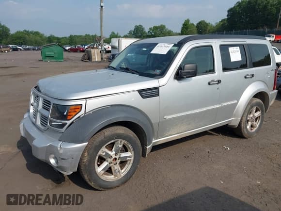 ✅ 2010 Dodge Nitro SXT • VIN: 1D4PU5GK8AW146087 • Lot: 42423104. Listed on IAAI with 220,381 mi. Free auction sales archive from the USA and detailed vehicle history report at DreamBid. Image 2.