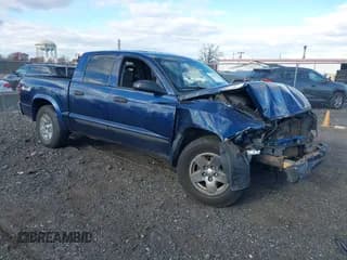 ✅ 2005 Dodge Dakota SLT • VIN: 1D7HW48N75S166543 • Lot: 43679489. Listed on IAAI with 197,288 mi. Free auction sales archive from the USA and detailed vehicle history report at DreamBid. Image 1.