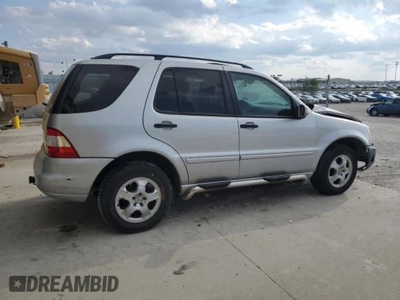 ✅ 2002 Mercedes-Benz M 320/430/500 • VIN: 4JGAB54EX2A307265 • Лот: 70041125. Опубликован ранее на Copart с пробегом 154 072 миль. Бесплатный доступ к архиву аукционных продаж из США и подробный отчёт об истории автомобиля на DreamBid. Изображение 3.