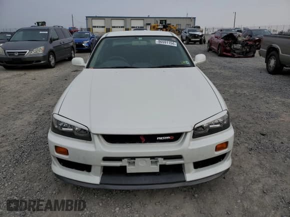 ✅ 1998 Nissan Skyline • VIN: ER34005709 • Lot: 86591154. Wystawiony na Copart z przebiegiem Nie podano. Bezpłatny archiwum sprzedaży aukcyjnych z USA i szczegółowy raport historii pojazdu na DreamBid. Zdjęcie 5.