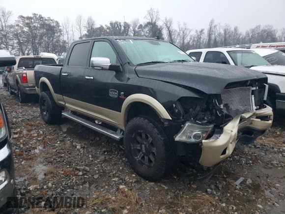 ✅ 2015 Ram 2500 Longhorn • VIN: 3C6UR5GL5FG571547 • Lot: 84160284. Wystawiony na Copart z przebiegiem 103 335 mil. Bezpłatny archiwum sprzedaży aukcyjnych z USA i szczegółowy raport historii pojazdu na DreamBid. Zdjęcie 4.