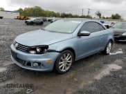✅ 2012 Volkswagen Eos Komfort • VIN: WVWBW7AH4CV011627 • Lot: 84918185. Listed on Copart with 96,247 mi. Free auction sales archive from the USA and detailed vehicle history report at DreamBid. Image 1.