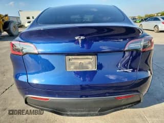 ✅ 2022 Tesla Model Y Long Range • VIN: 7SAYGDEE1NA007249 • Lot: 90043905. Listed on Copart with 85,781 mi. Free auction sales archive from the USA and detailed vehicle history report at DreamBid. Image 6.