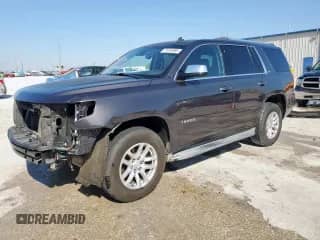 2015 Chevrolet Tahoe LTZ z VIN 1GNSCCKC5FR203941, wystawiony jako Copart lot #71234985 z przebiegiem 179 557 mil mil oraz Czysty tytuł • Clean title. Historia ofert i sprzedaży dostępna na DreamBid. Obrazek 1.